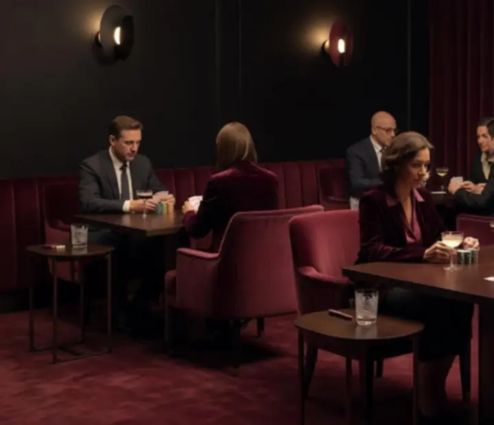 Private card salon with felt tables prepared for an intimate tournament